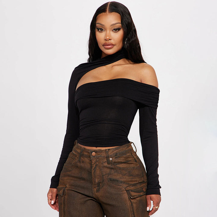Dame mode top med asymmetrisk snit og elegant ruchesdetalje Skovae
