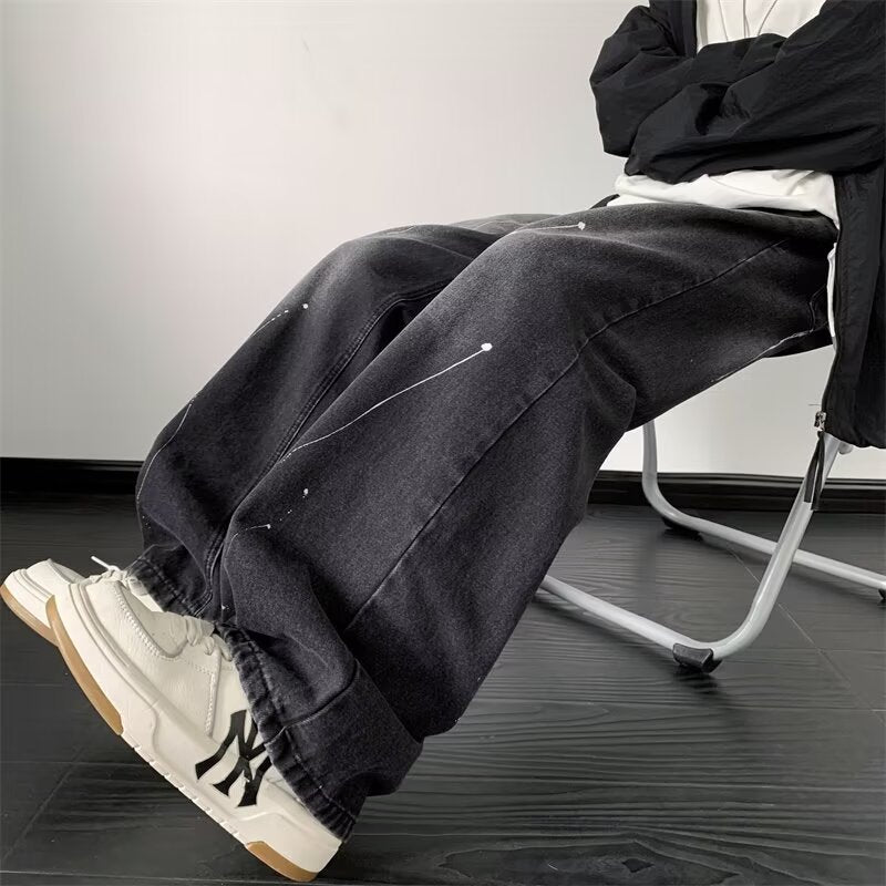 Unisex brede jeans med kreative detaljeprints Stilla