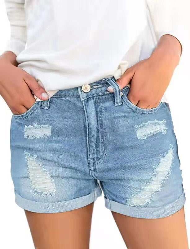 Dame jeansshorts med moderne rivdetaljer og afslappet snit Skovae