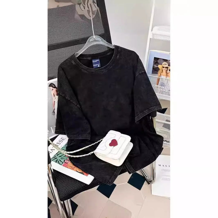 Dame T-shirt i afslappet oversized stil med særligt kreativt grafiktryk Stilla