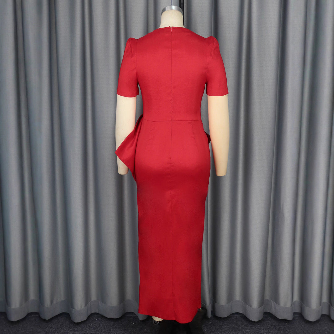 Dame maxikjole med elegant drapering og voluminøs nederdel Skovae