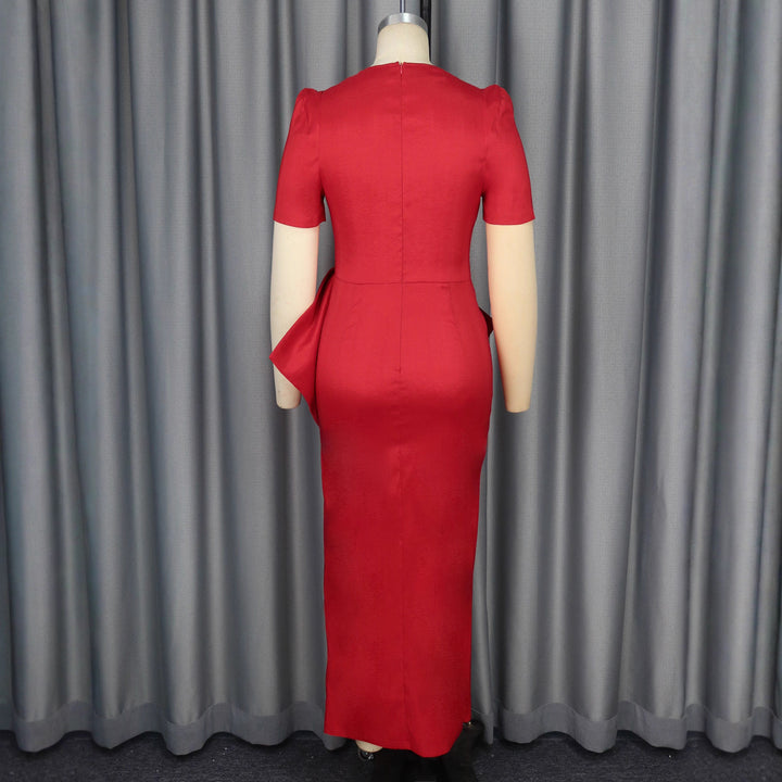 Dame maxikjole med elegant drapering og voluminøs nederdel Skovae