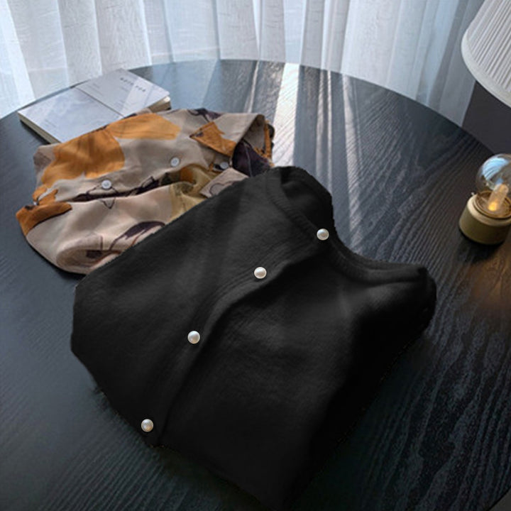 Kvinders cardigan med elegante perleknapper og moderne design Stilla