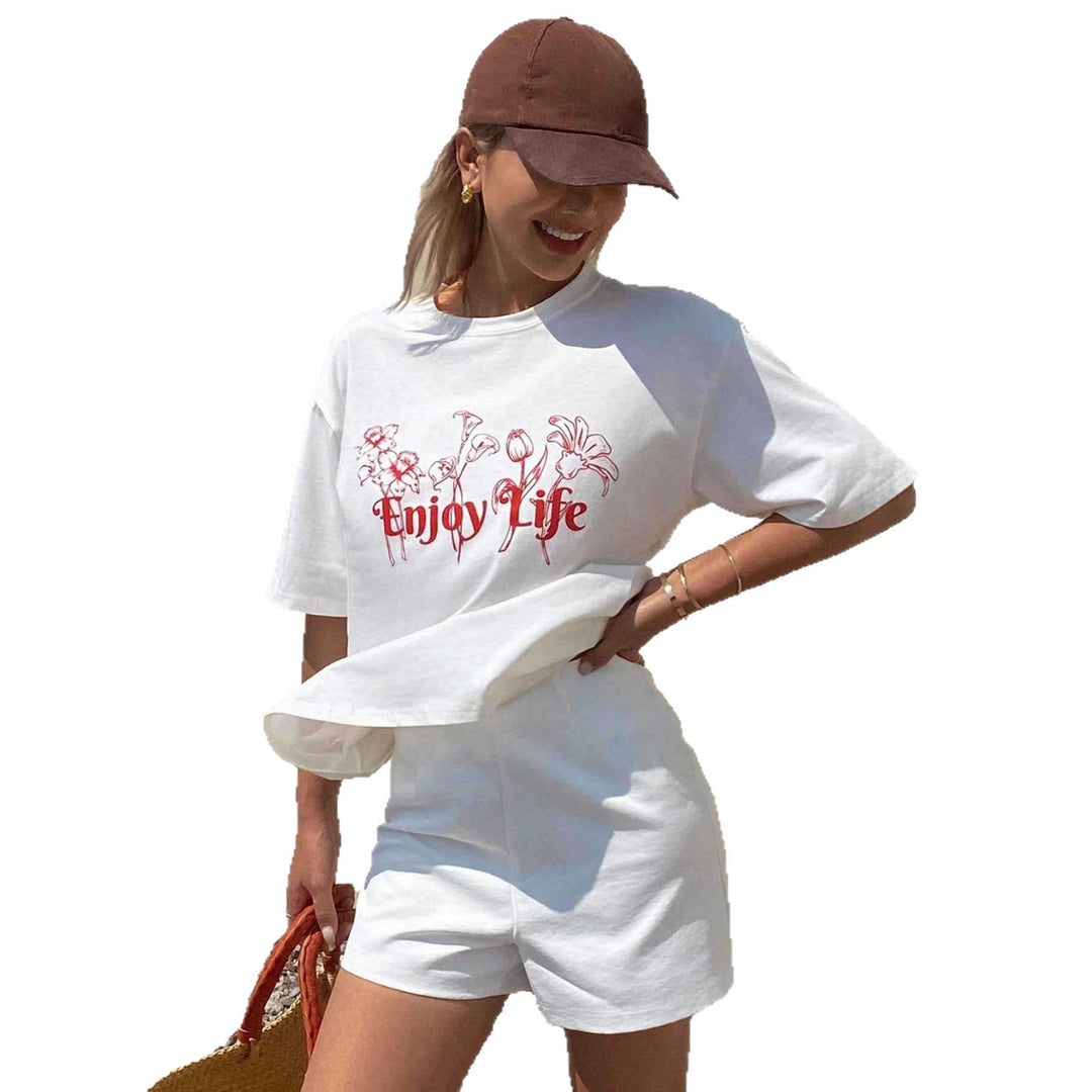 Dame Løs oversized T-shirt med blomsterprint og inspirerende tekst Skovae