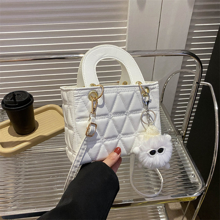 Femme quilted håndtaske med aftagelig charme Stilla
