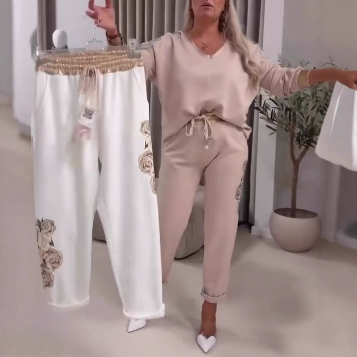 Kvinde sport outfit med dekorative blomsterprint og elastisk talje Stilla