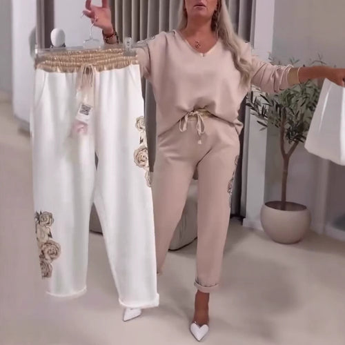 Kvinde sport outfit med dekorative blomsterprint og elastisk talje Stilla