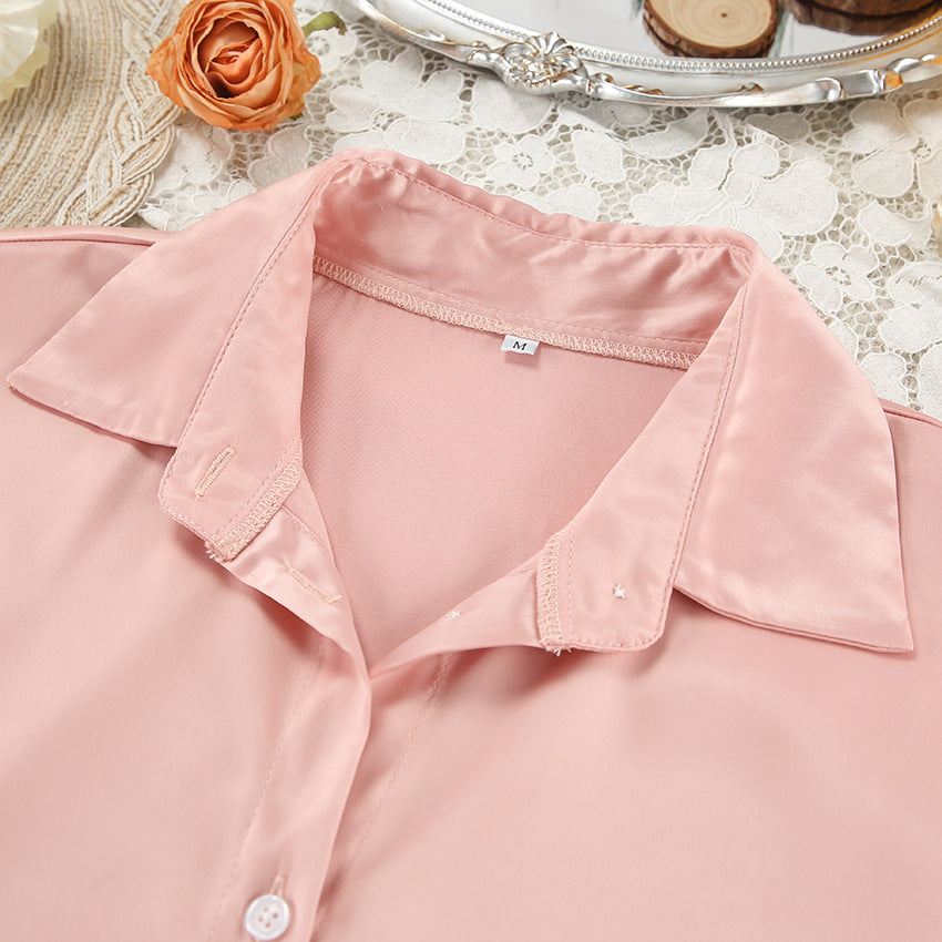 Dame Satin top i elegant oversized snit med knapdetaljer Stilla