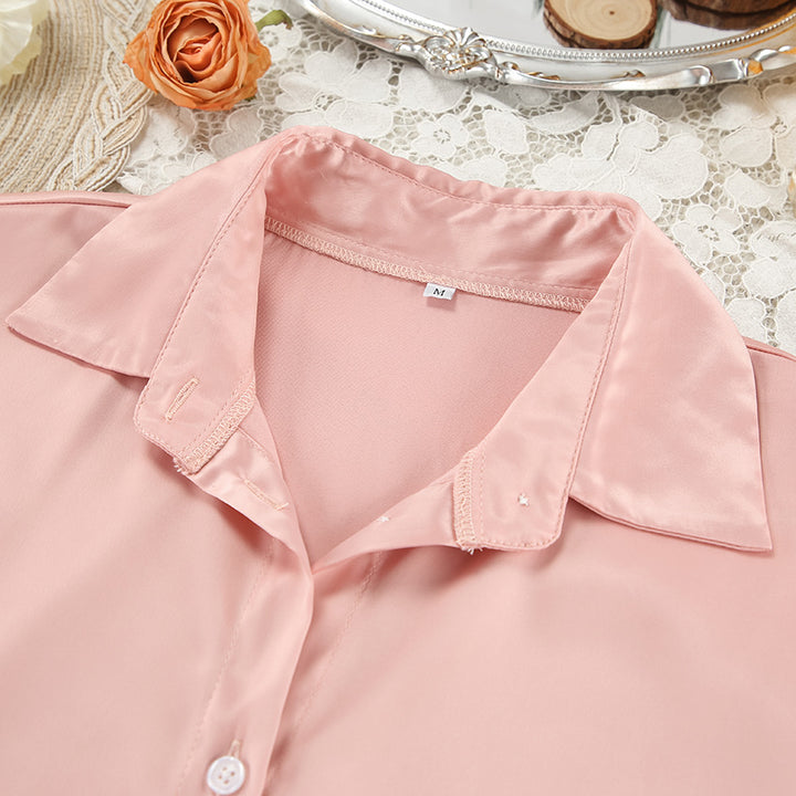 Dame Satin top i elegant oversized snit med knapdetaljer Stilla
