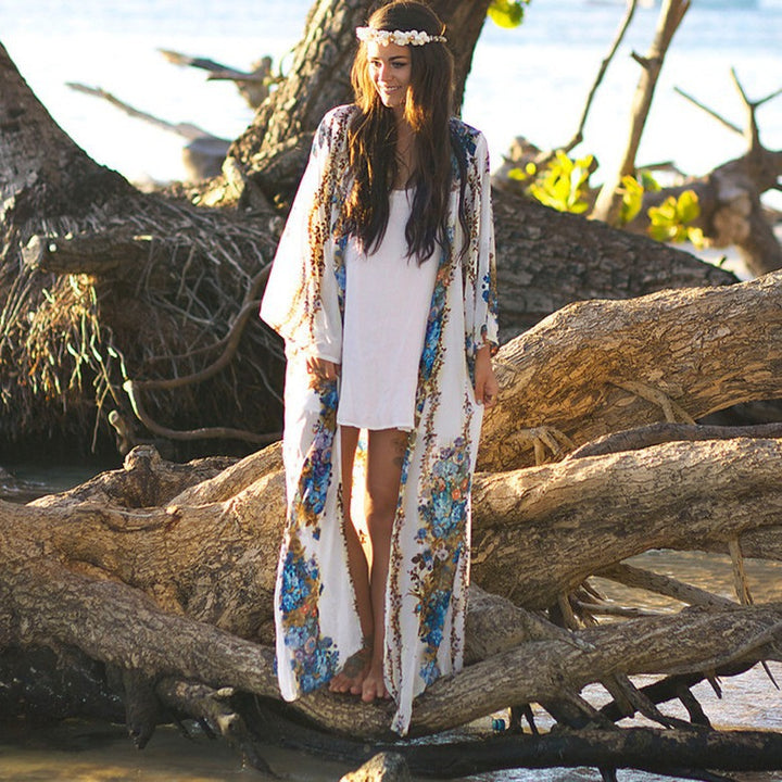Dame Strandoverdel med florale accenter og vid silhuet Stilla