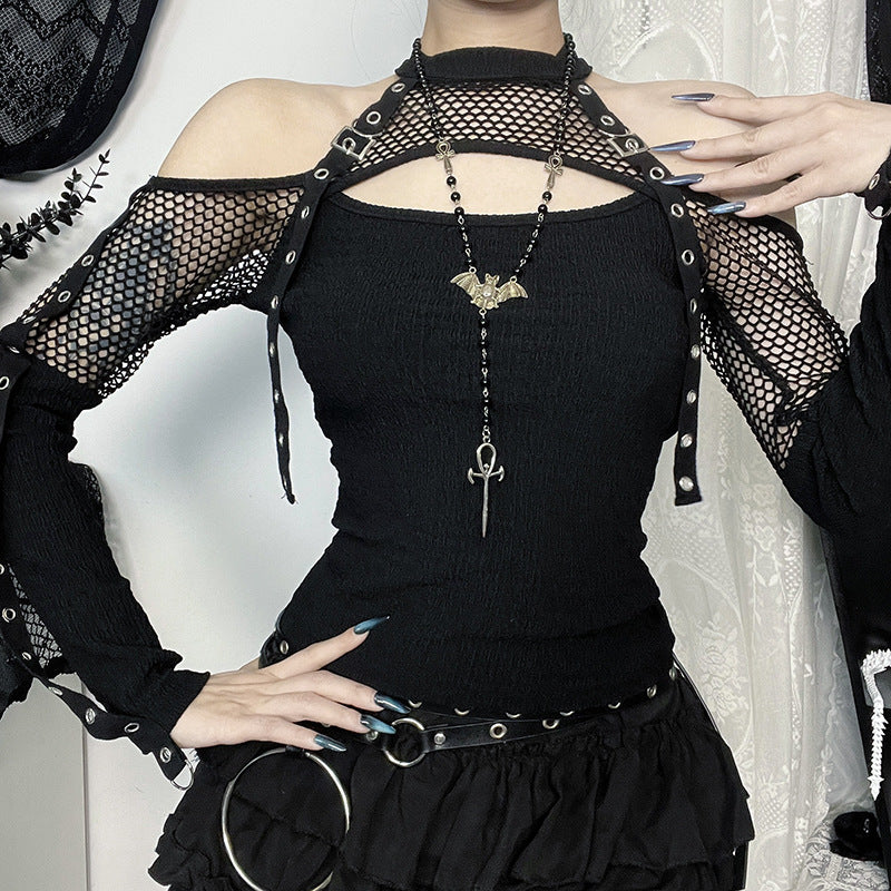 Dame mode top med unikt cut-out design og netdetaljer Skovae