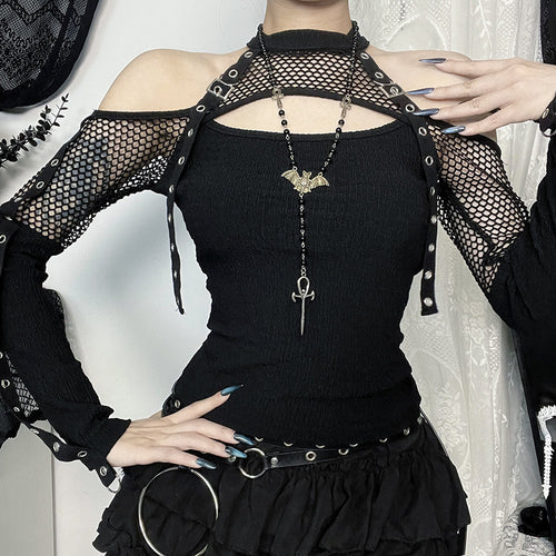 Dame mode top med unikt cut-out design og netdetaljer Skovae