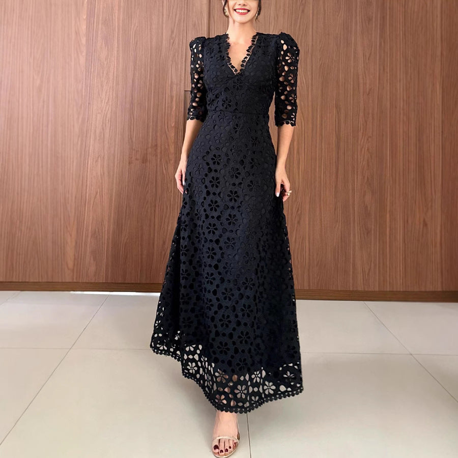 Dame spids-maxikjole med gennembrudt design og elegante puffærmer Stiila