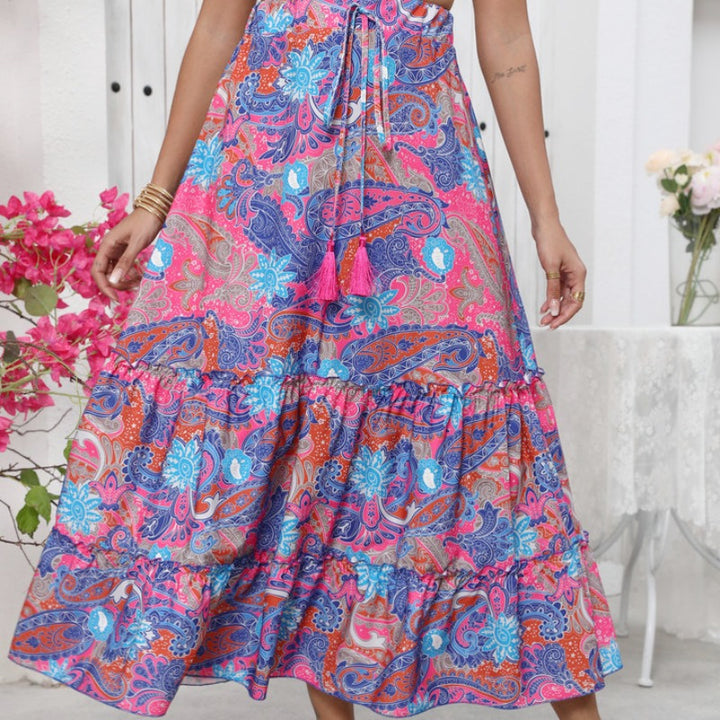 Dame midi-nederdel i legende boho-stil med farverigt paisleymønster og voluminøst fald Skovae
