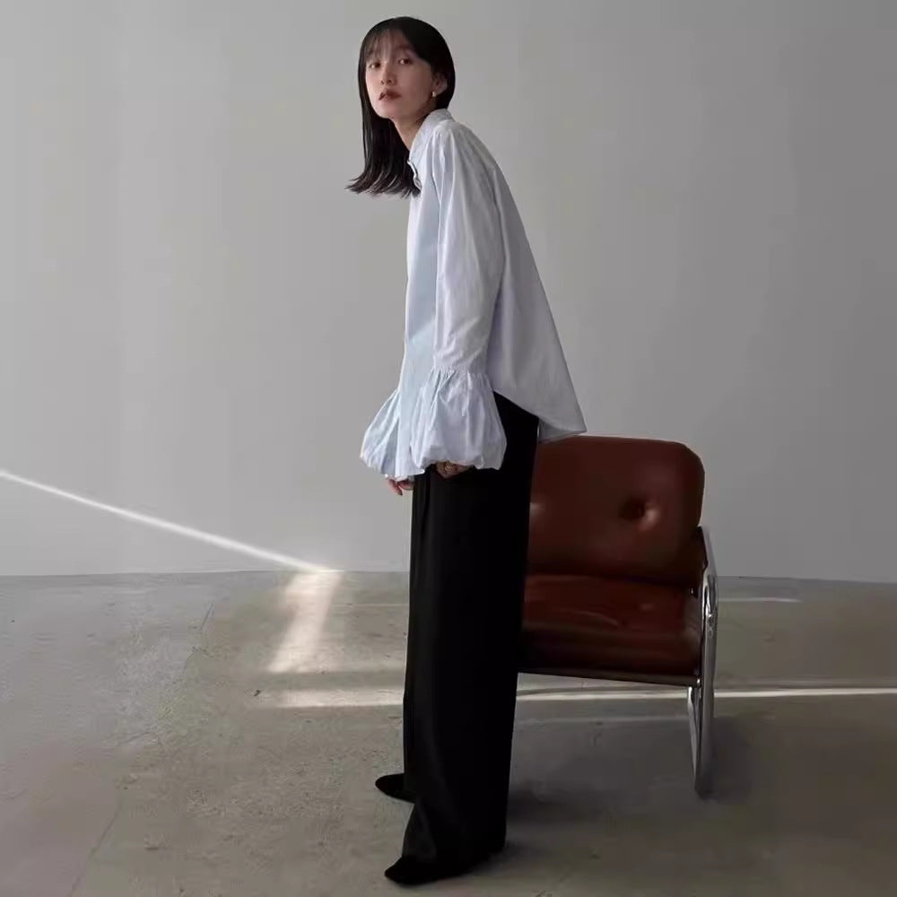 Kvinders elegante bluse med voluminøse ærmer og stående krave Stilla