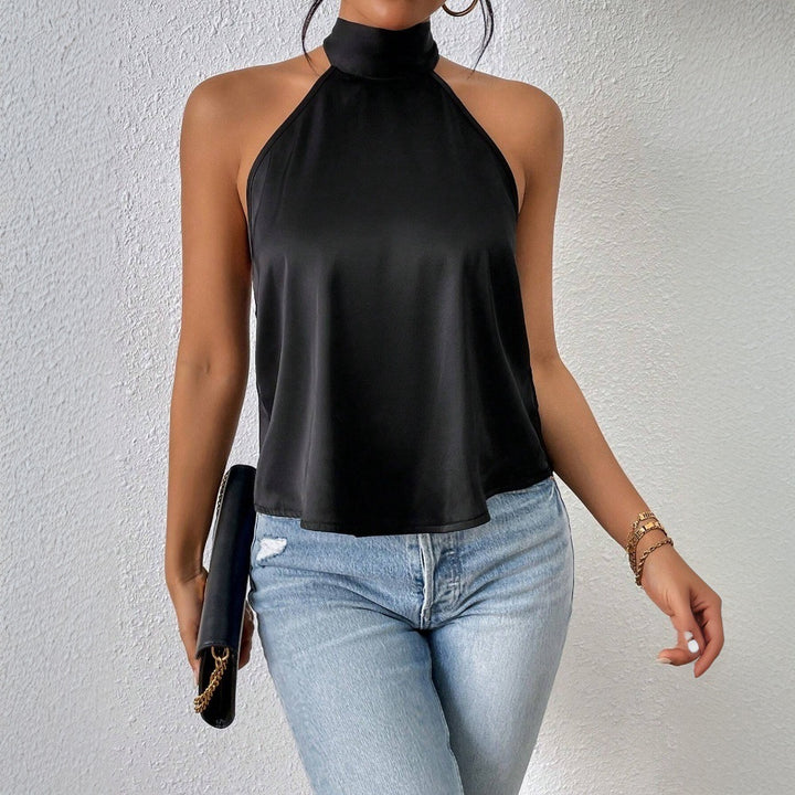 Kvindernes elegante halterneck top med silkeagtig finish Stilla