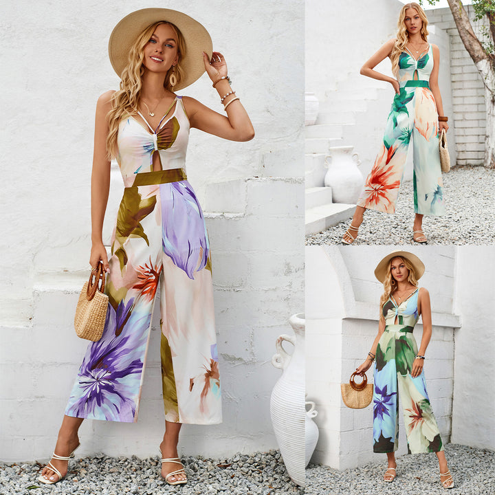 Dame jumpsuit med blomsterprint og bindebælte Stilla