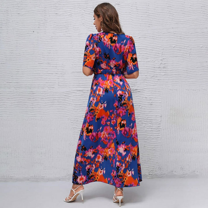Dame maxikjole med asymmetrisk kant og florale akcenter Stilla