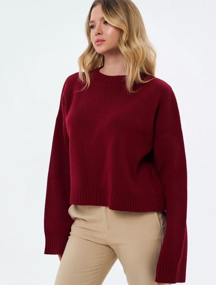 Dame hyggelig cropped sweater med afslappede ballonærmer og ribstruktur Stilla