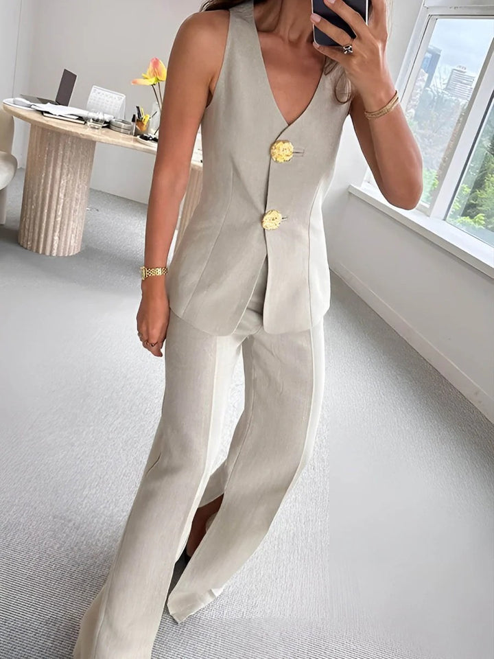 Dame elegant jumpsuit med front knaplukning og bred ben Skovae