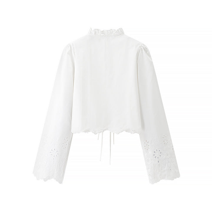 Damebluse med flæsedetaljer og floral broderi Stilla