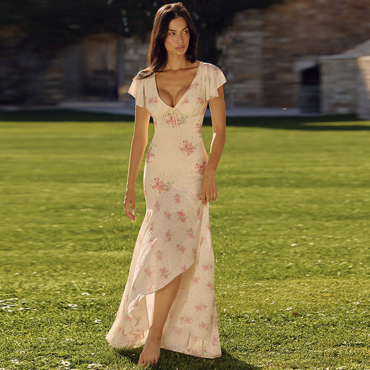 Dame Maxikjole med blomsterdesign og raffinerede cut-outs Skovae