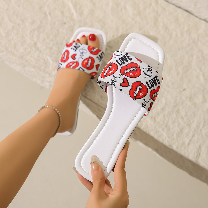 Dame slide-sandaler med trendy kys-motiv og behagelig sål Stilla