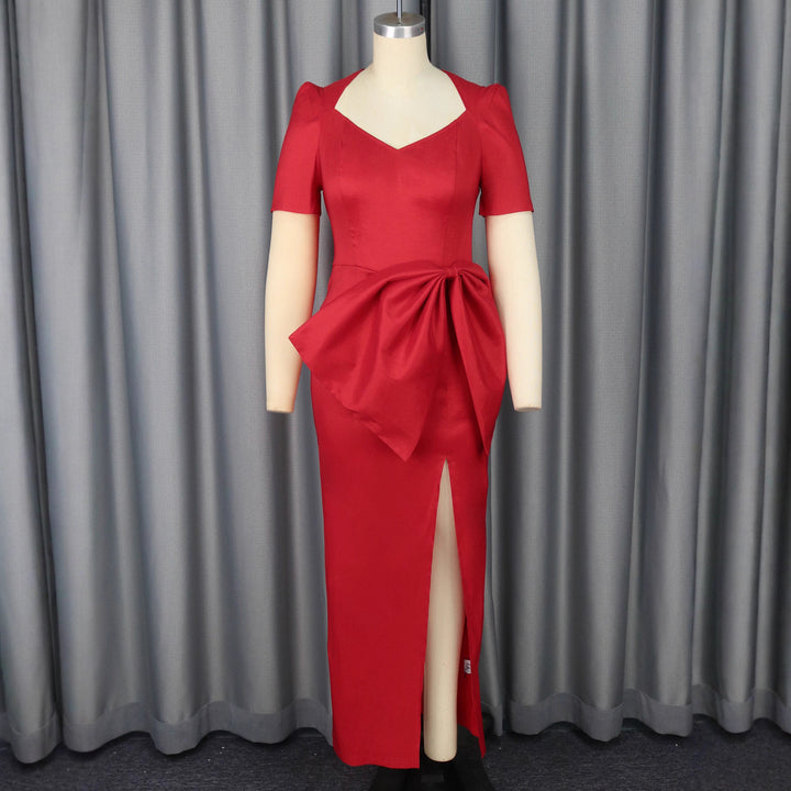 Dame maxikjole med elegant drapering og voluminøs nederdel Skovae