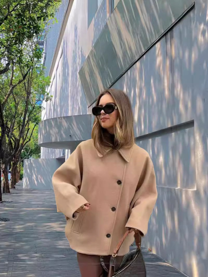 Dame Oversized Uldjakke med store lommer og elegant Replay Stilla