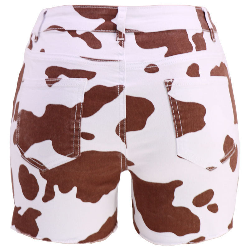 Damer fashionable jeans-shorts med spændende kuhprint og frynse kant Stilla