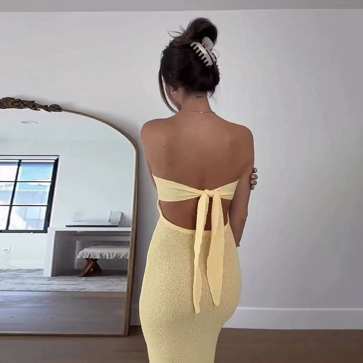 Dame maxikjole med elegant bandeau-udskæring og minimalistisk silhuet Skovae