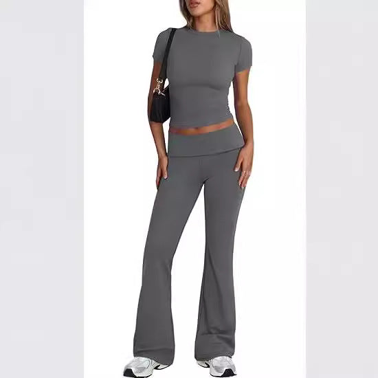 Dame sæt bestående af tætsiddende top og bootcut-bukser Stilla