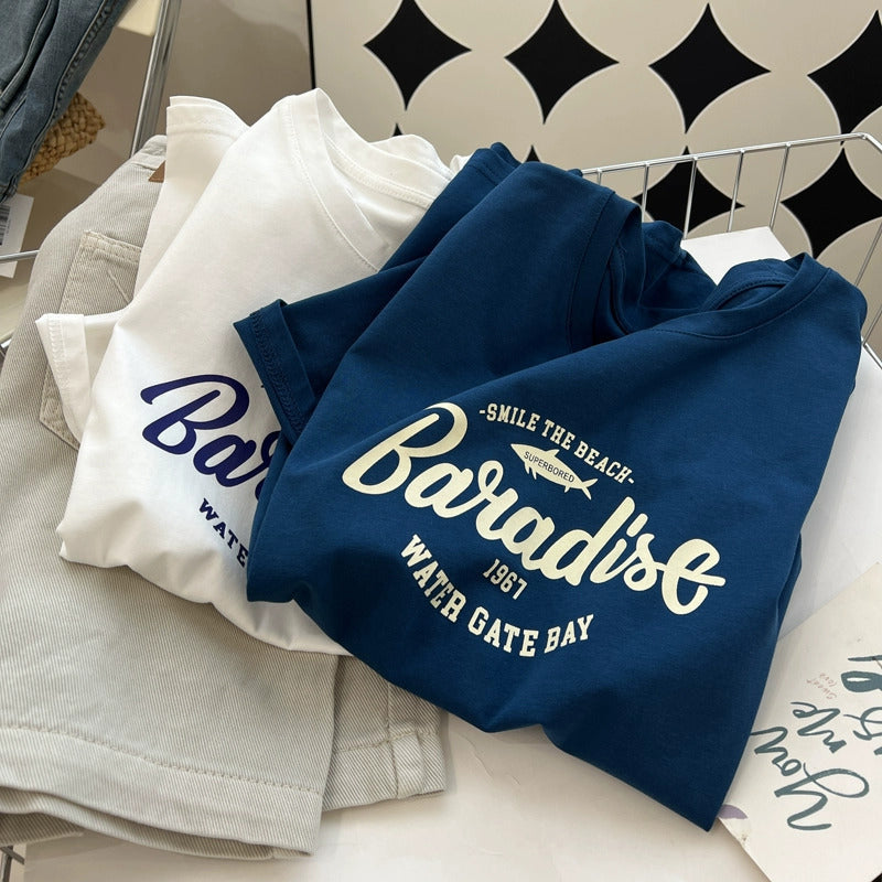 Dame T-shirt med begrundet Paradise-tryk og løs pasform Stilla