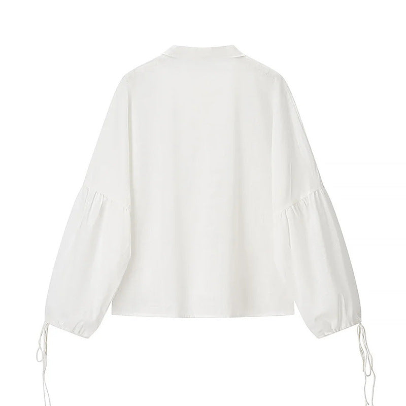 Damebluse med elegante sløjfebånd og voluminøse ærmer Stilla