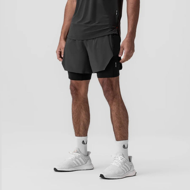 Herrer Sportsløbeshorts med sidelommer og elastisk bånd Stilla