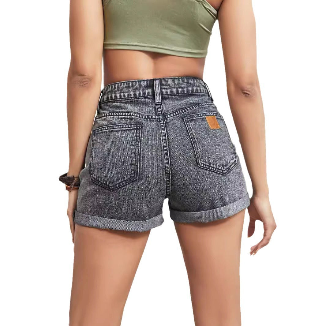 Dame mode Denim-shorts med stilfulde revnedetaljer og opsmøgte kanter Stilla