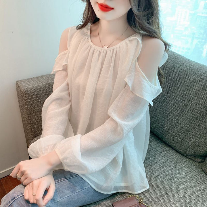Kvinders bluse med off-shoulder design og flæse detaljer Stilla