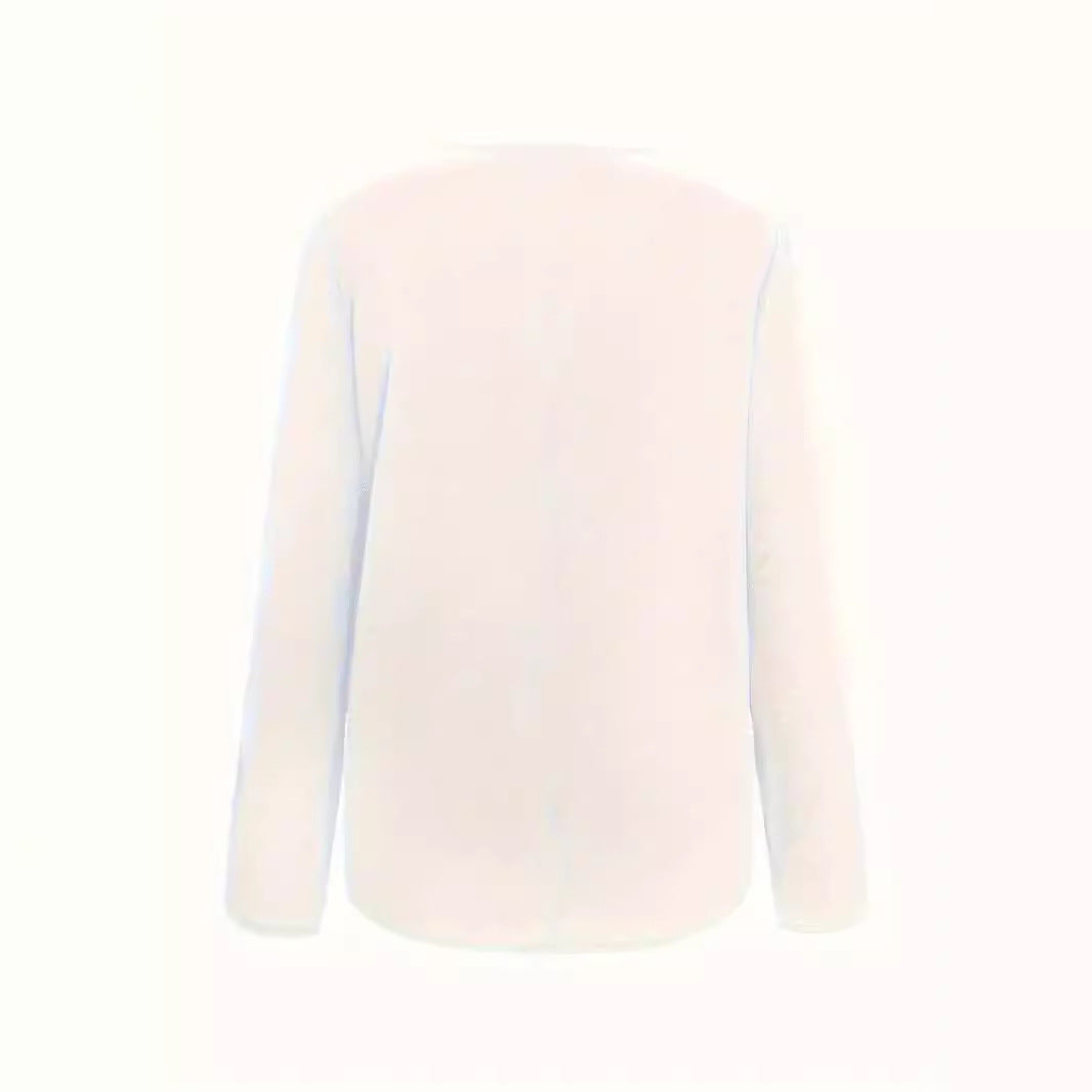 Dame asymmetrisk top med knapdetaljer Stilla