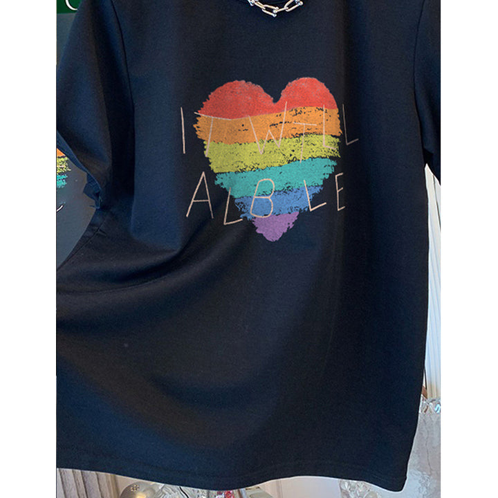 Dame T-shirt med kreativt regnbueskærtsmotiv og inspirerende skrift Stilla