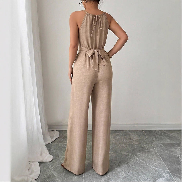 Dame gulvlængde jumpsuit med raffineret indpakningsdesign og elegant taljesøm Skovae