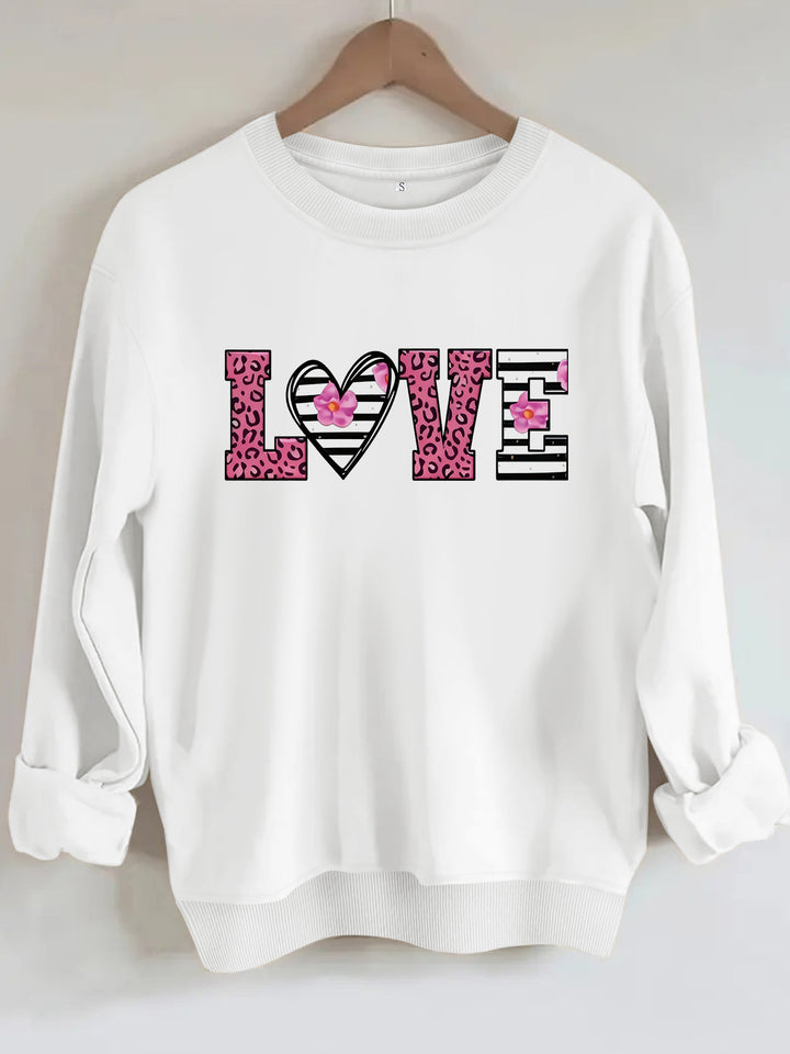 Kvinders sweatshirt med moderne leopard hjerte design og behagelig pasform Stilla
