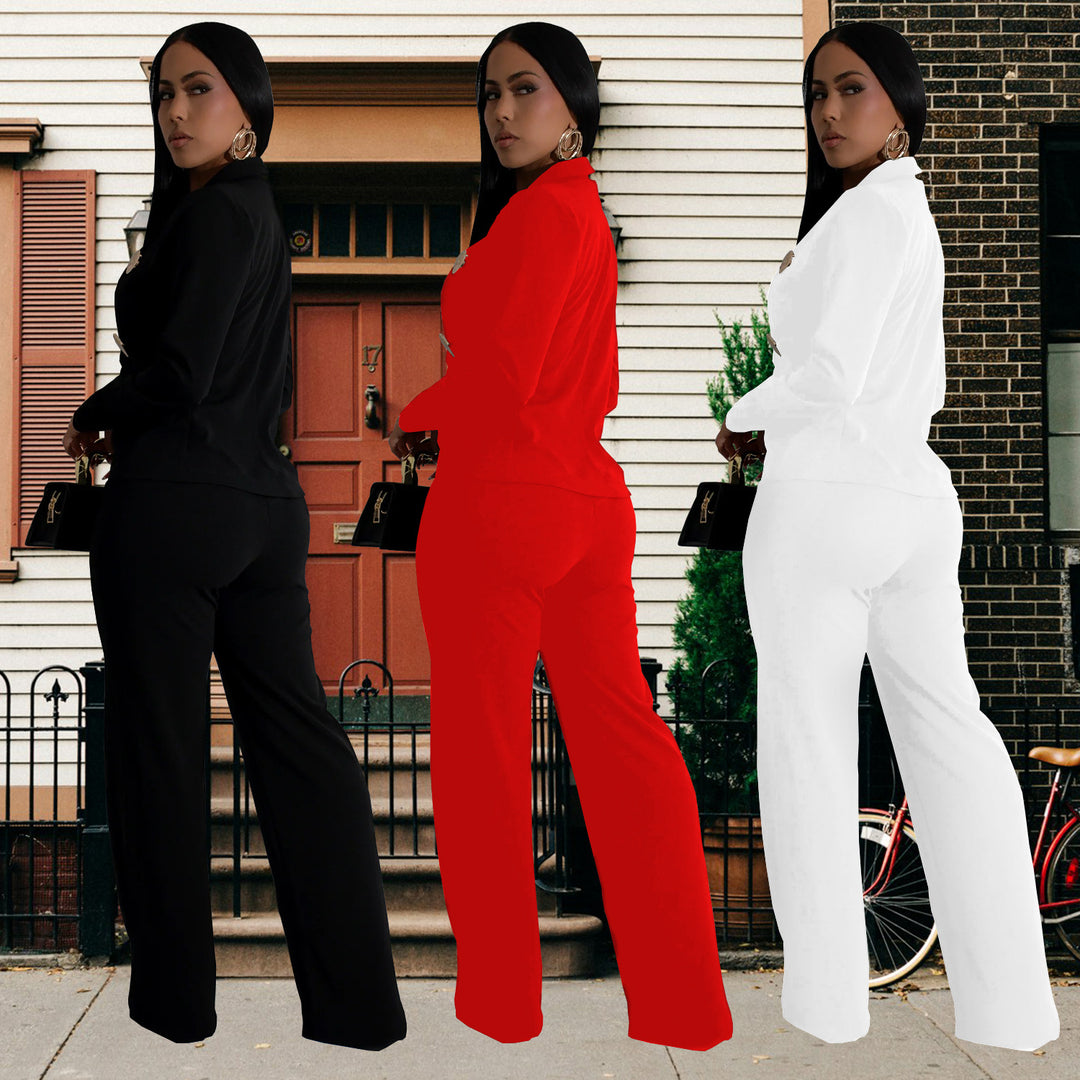 Dame elegant jumpsuit med skinnende knapdetaljer og dyb udsnit Stilla