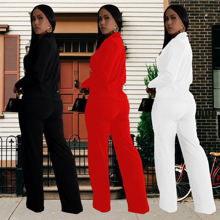 Dame elegant jumpsuit med skinnende knapdetaljer og dyb udsnit Stilla