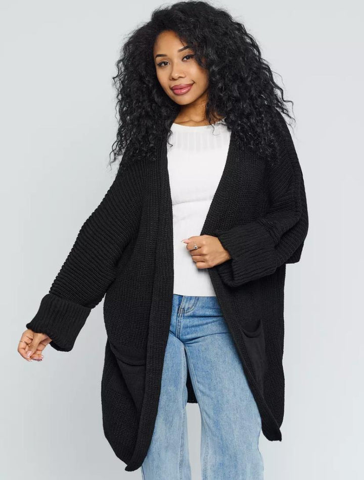 Dame Oversized Strikjakke med store lommer og komfortable ribærmer Stilla