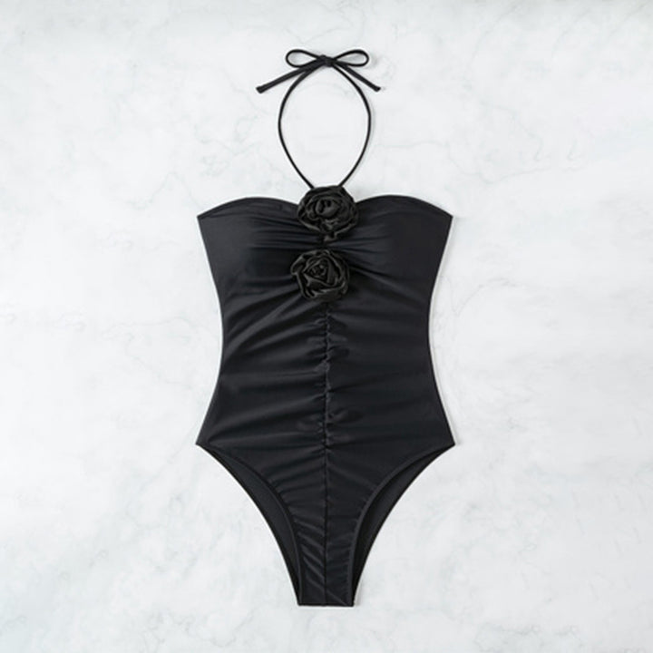 Dame one-piece badedragt med raffinerede flæsedetaljer og elegant blomsterprint Stilla