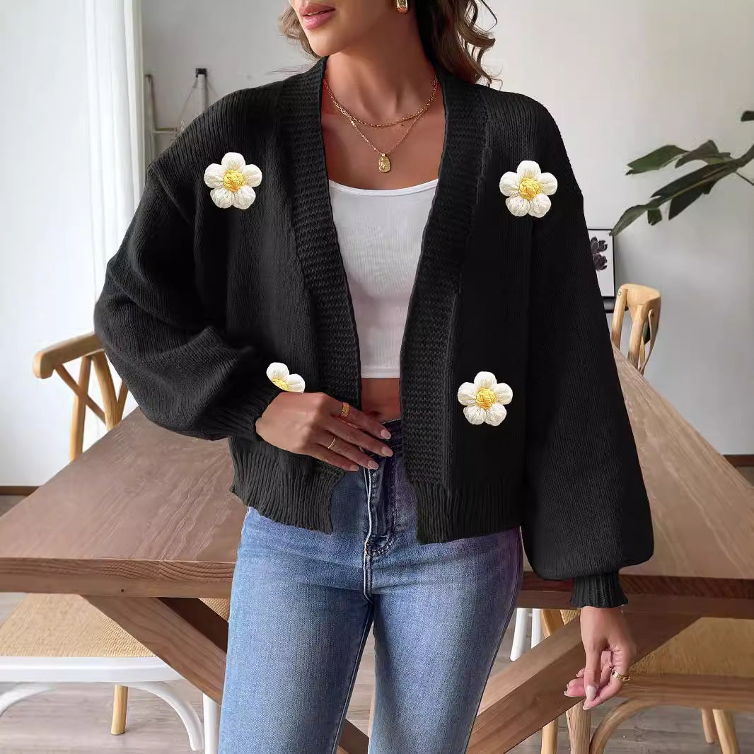 Dame grovstrikket jakke med blomsterdesign Stilla