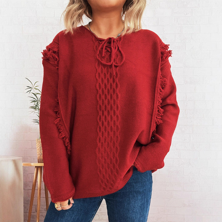 Kvinders chunky strikket sweater med afslappede frynser og dekorativ kabel-design Stilla