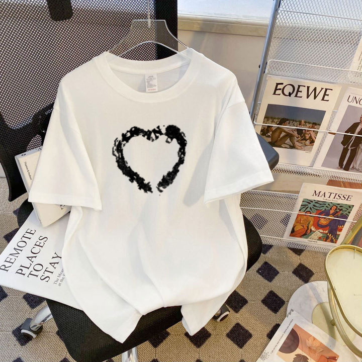 Dame T-shirt med kreativ hjerte-design og afslappet pasform Stilla