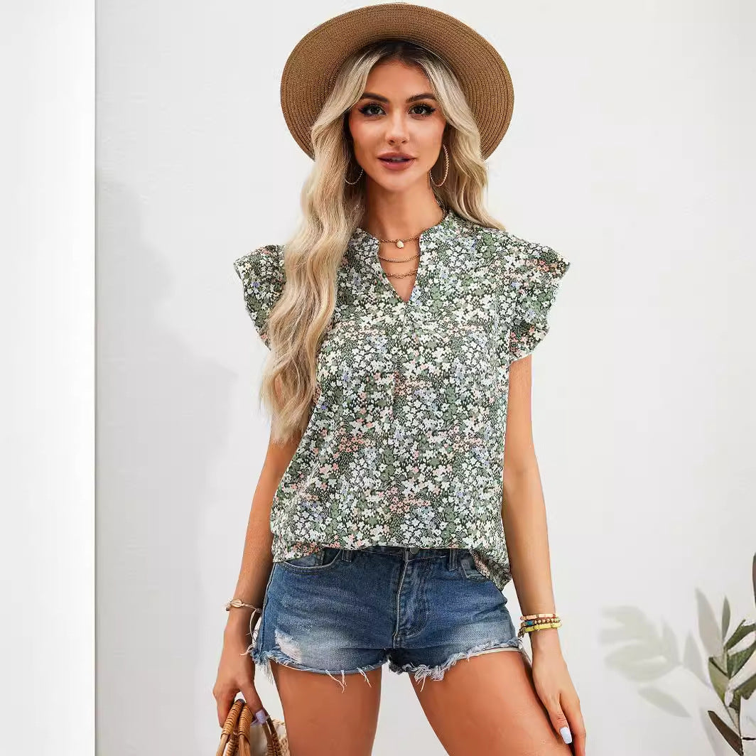 Dame feminin bluse med flæsedetaljer og blomstertryk Stilla