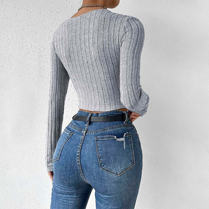 Kvindernes cropped top med tidløst twist design og lange ærmer Stilla